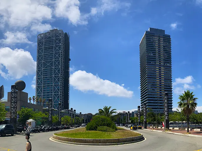 Modern high-rise buildings and roundabout in the Olympic Village area.
